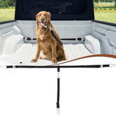 Snagle Paw heavy-duty leash setup secures dogs in a truck bed during travel.