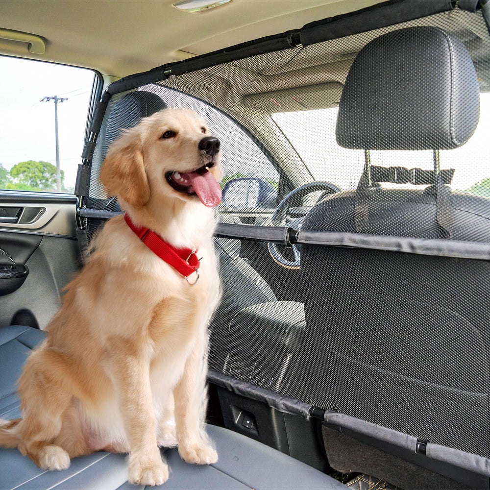 Snagle Paw see-through mesh barrier keeps pets secure in the back seat.