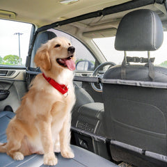 Snagle Paw see-through mesh barrier keeps pets secure in the back seat.