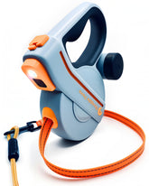 Snuggle Paws retractable leash with LED flashlight for safer night walks.