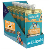 Solid Gold Chicken Bone Broth pour-over topper enhances flavor and hydration for dry dog food.