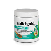 Solid Gold SeaMeal powder beside a dog bowl for skin and coat support