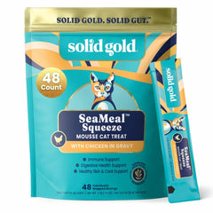 Solid Gold SeaMeal Squeeze chicken treat bottle highlights convenient, lickable feeding.