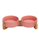 SPUNKYJUNKY ceramic bowl with wooden stand for tidy meals and better posture.
