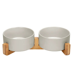 SPUNKYJUNKY ceramic bowl with wood stand promotes tidy meals