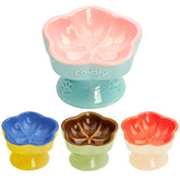 S&Q'S CERAMICS raised cat bowl pink angle view, elevated feeding solution.