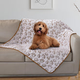 Stuffed dog blanket with paw-print top for cozy naps.
