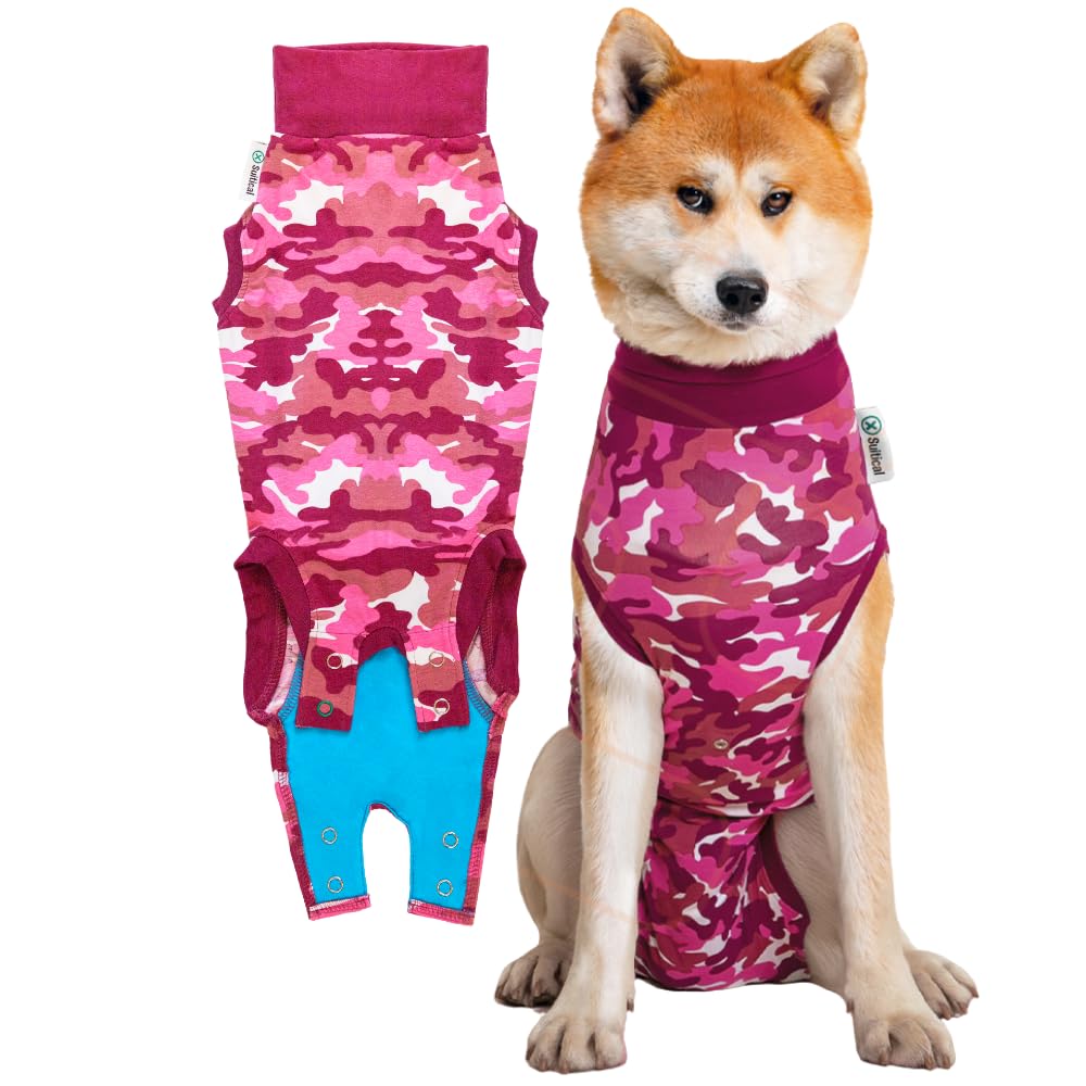 Suitical Recovery Suit in pink camouflage worn by a dog for post-surgery comfort and protection.