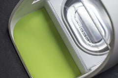 Close-up of SureFlap stainless steel bowls on a feeder, highlighting sealed design for fresher meals.