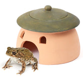 Tbpro terracotta reptile cave with green lid offers a weatherproof hiding retreat.