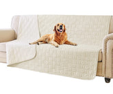 Tcksstex waterproof dog bed cover on sofa protecting furniture from spills and accidents.