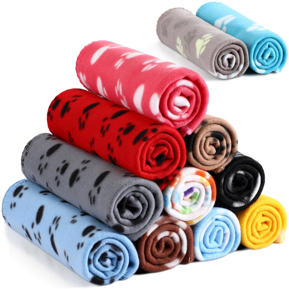 Tegeme paw print blanket set in soft fleece for cozy pet spaces.