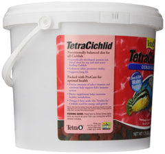 TetraCichlid flakes in tank water illustrating the clear-water formula for a pristine aquarium.