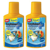 Tetra EasyBalance Plus bottle being poured to stabilize aquarium water quality.
