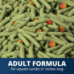 Tetra ReptoMin Pro Sticks floating food shown in turtle tank