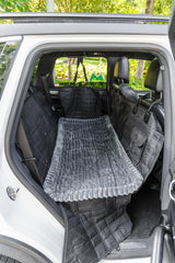 TGODGPY fuzzy backseat pet mat adds cozy padding for small to medium dogs.