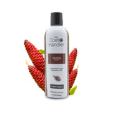 The Coat Handler clarifying dog shampoo bottle promotes gentle cleansing with an all-natural formula.