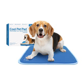 The Green Pet Shop Cool Pet Pad small blue on the floor offers quick cooling for dogs.