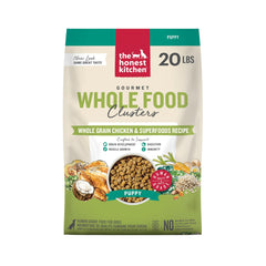 The Honest Kitchen Puppy Blend bag shows human-grade ingredients for healthy growth.