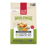 The Honest Kitchen Wholemade chicken dog food in a 2lb box, convenient for quick meals.