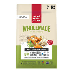The Honest Kitchen Wholemade chicken dog food in a 2lb box, convenient for quick meals.