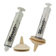 The Miracle Nipple base kneading-pad supports tiny paws during feeding.