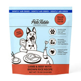 The Pets Table Lamb & Beef air-dried dog food bag with brown rice for balanced nourishment.