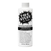 The Stuff leave-in detangler bottle pour demonstrates quick no-rinse grooming for dogs.
