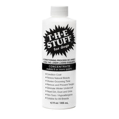 The Stuff leave-in detangler bottle pour demonstrates quick no-rinse grooming for dogs.