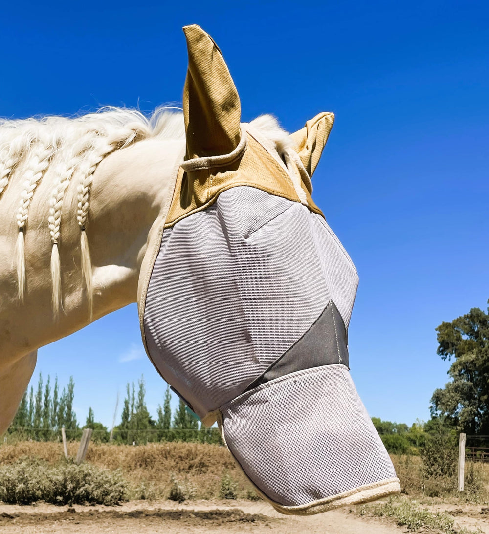 The Sunny Zebra fly mask on horse face front provides UV protection and clear field of vision.