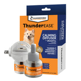 ThunderEase diffuser in living room emitting a soothing pheromone scent for calm dogs.