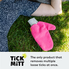 TiCK MiTT Pink Tick Removal Glove on a pet, safe for sensitive skin