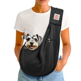 Tomkas front zippered pocket sling carrier keeps essentials secure during outings.