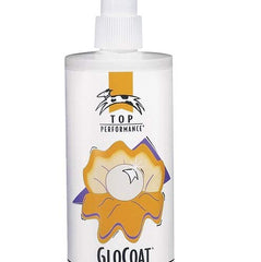 GloCoat being sprayed onto a dog's coat for detangling and easy brushing