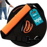 Total Pet 100ft leash extended for open-area recall training and exploration.