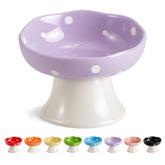 TRUNDISAN ceramic elevated cat bowl tilts to support comfortable eating and neck posture.