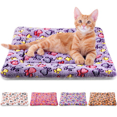 Tuanse four-pack ultra soft bed mats with paw-print pattern for small pets, cozy and washable.