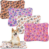 Tuanse four-pack ultra-soft pet bed mats with paw pattern for cozy crate use.