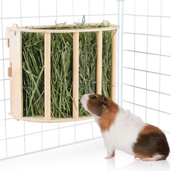 Unicorn Catcher wooden guinea pig hay feeder keeps hay tidy and accessible.