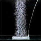 UPETTOOLS nano air stone 2 inch disk releasing tiny bubbles for efficient oxygen diffusion.