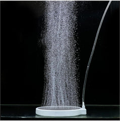 UPETTOOLS nano air stone 2 inch disk releasing tiny bubbles for efficient oxygen diffusion.