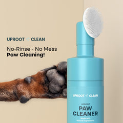 Uproot Clean dog paw cleaner nozzle being pressed to wet the brush for no-rinse use.