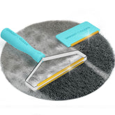 Uproot Cleaner Pro on couch removing embedded pet hair for a cleaner living room