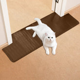 Uross carpet protector with brown rounded corners shields carpets from pet scratches.