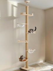 Veehoo floor-to-ceiling cat tree setup showing adjustable height for compact spaces