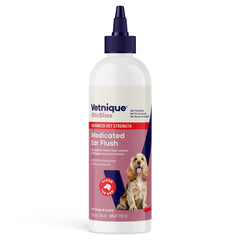 Vetnique Oticbliss bottle close-up, medicated ear cleaner for pets.