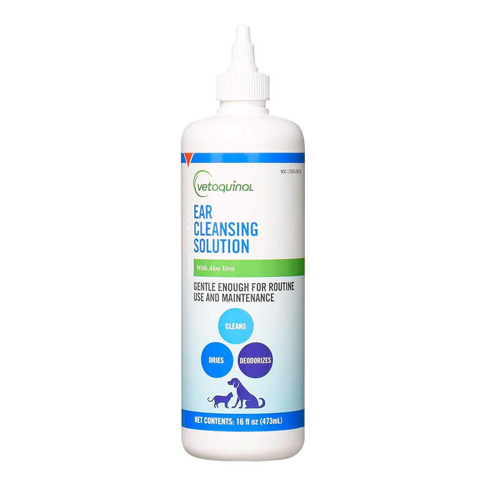 Vetoquinol ear cleansing solution bottle pour for dogs and cats, routine cleaning.