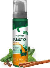 Vet's Best waterless bath bottle pouring foaming shampoo onto a dog's coat