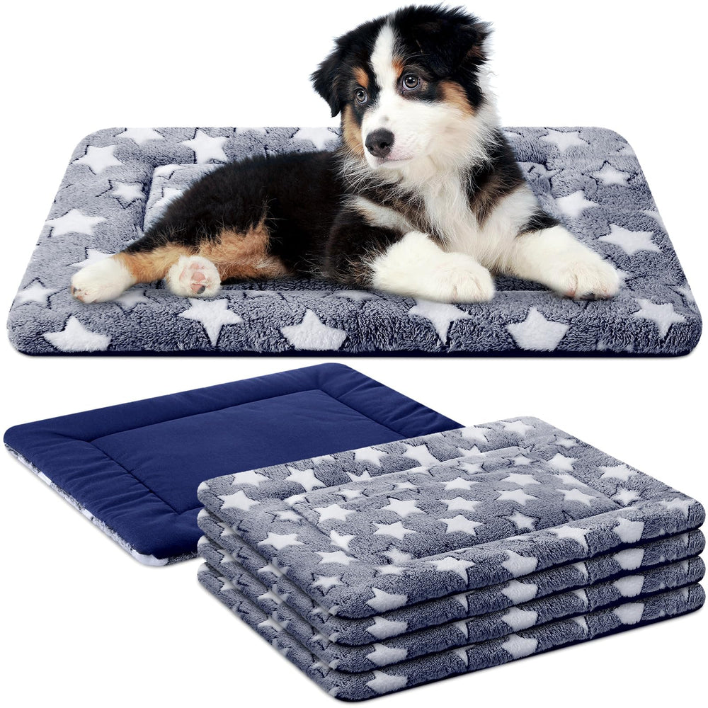 VitalCozy 4pc blue dog crate pad pack shows soft padding for cozy crate comfort.
