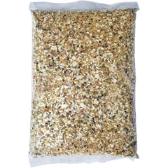 Close-up of diced carrots, papayas, and apples in Volkman Eclectus blend for natural fiber
